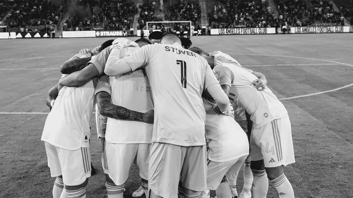 Austin FC team huddle prior to LAFC match