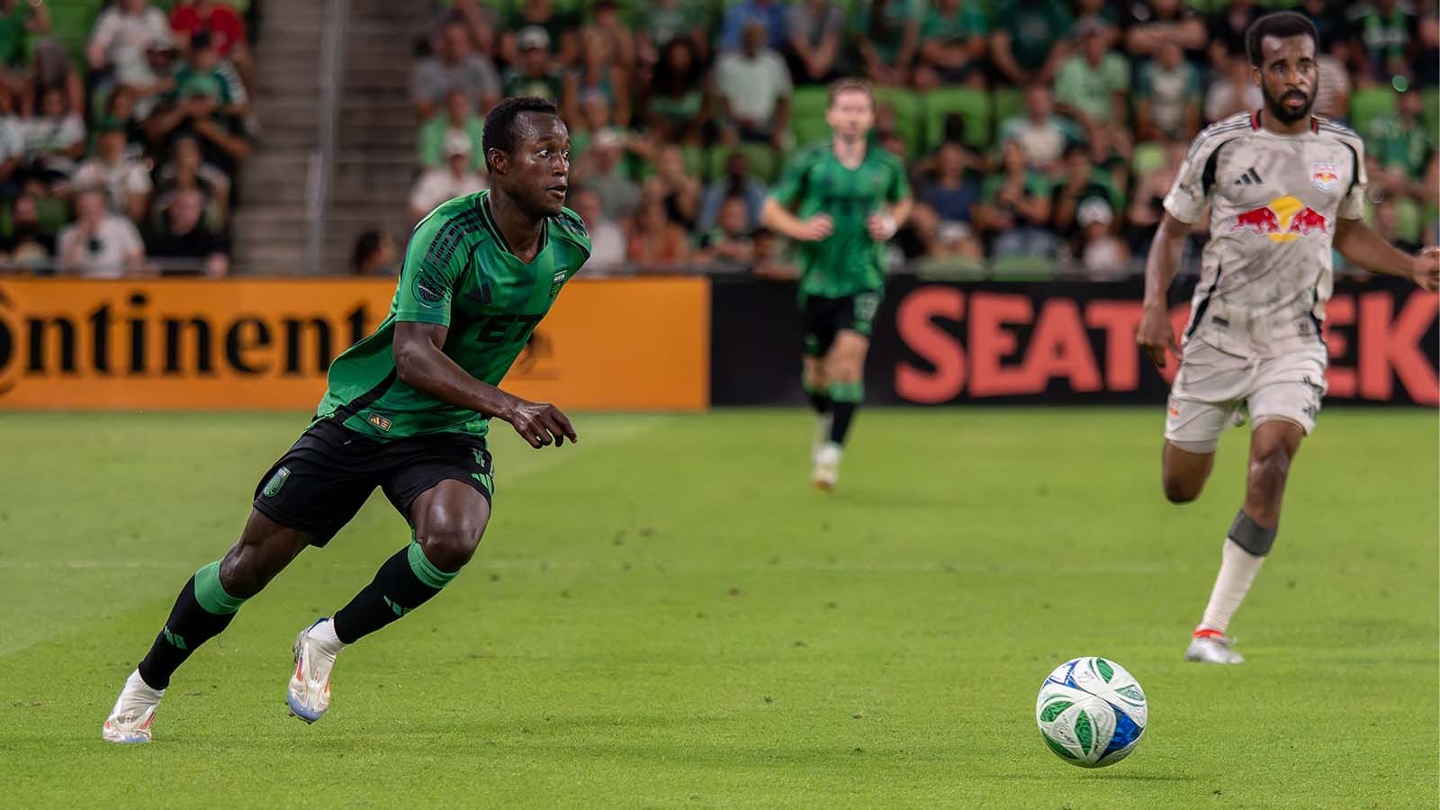 Austin FC's Osman Bukari chasing after ball in match vs. Red Bulls