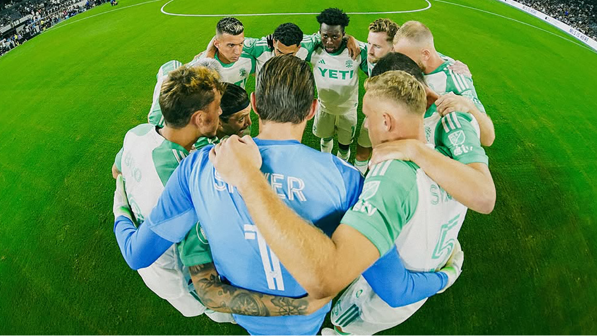 Austin FC huddling before their match with LAFC