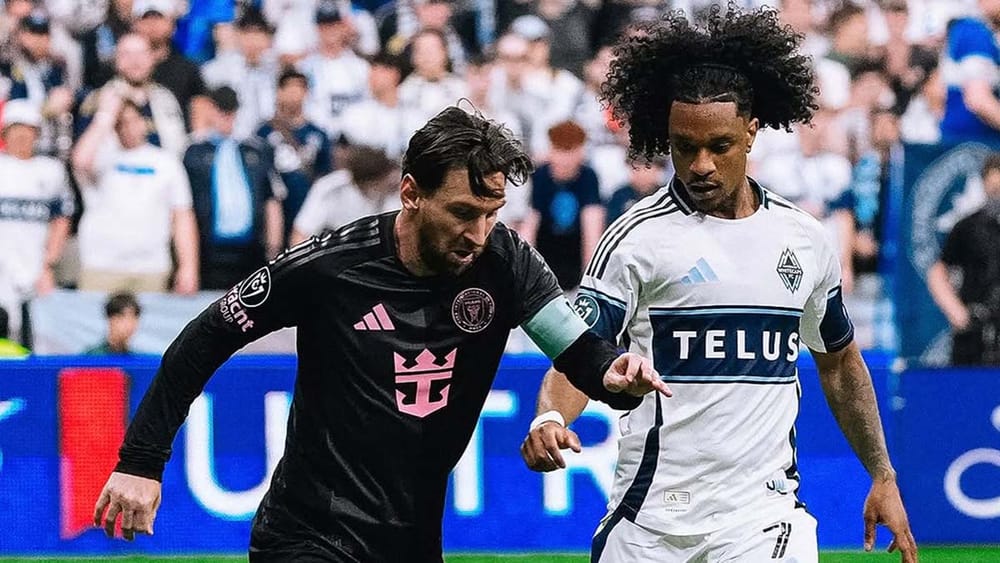 Jayden Nelson of Vancouver Whitecaps FC playing against Lionel Messi of Inter Miami CF