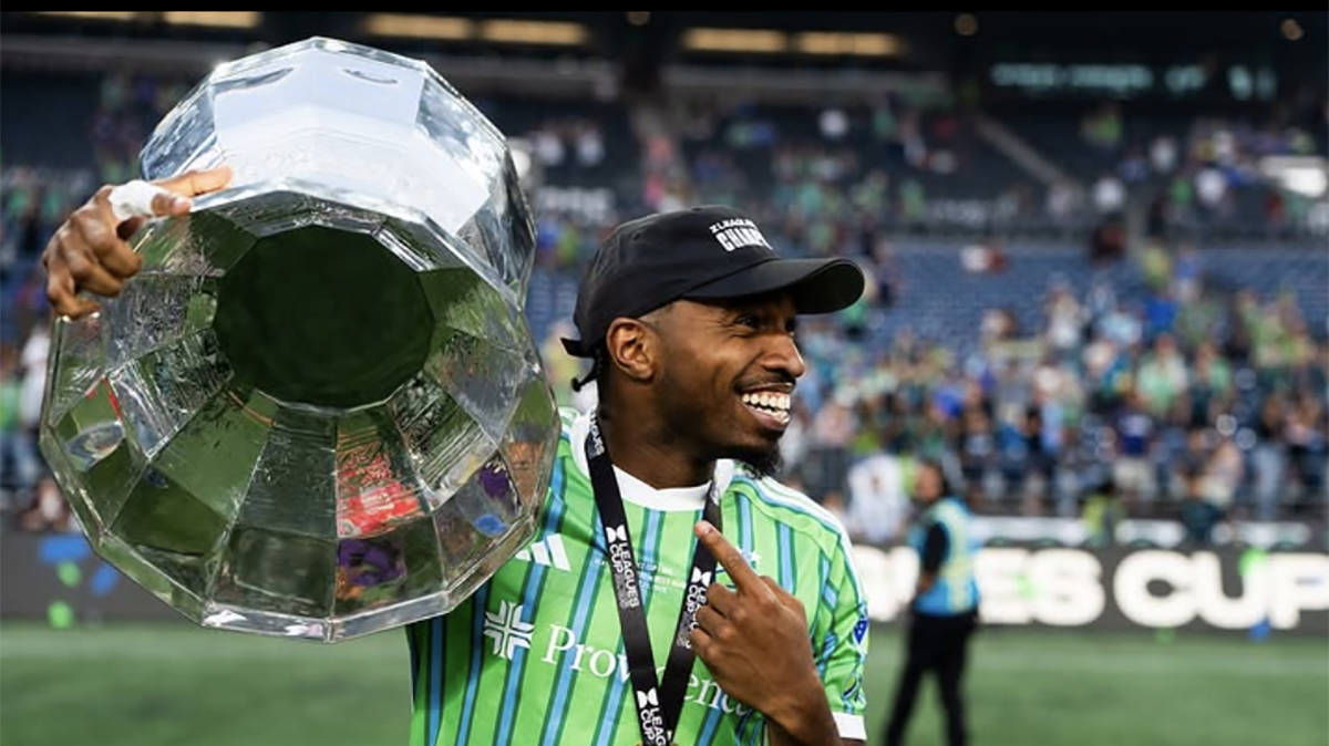 Jon Bell of Seattle Sounders FC holding the Leagues Cup trophy
