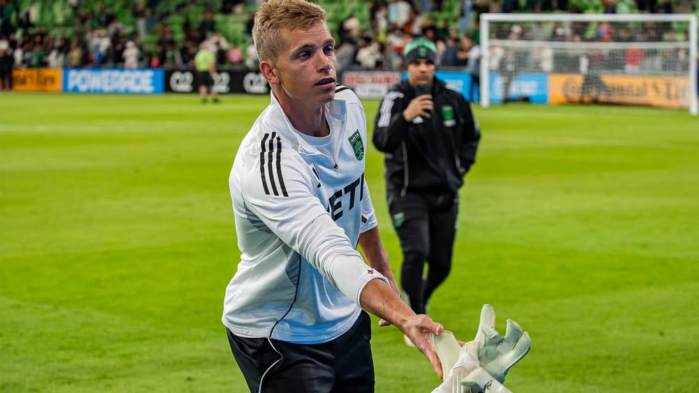 Stefan Cleveland throwing glove to fan after Austin FC's playoff exit loss to LAF