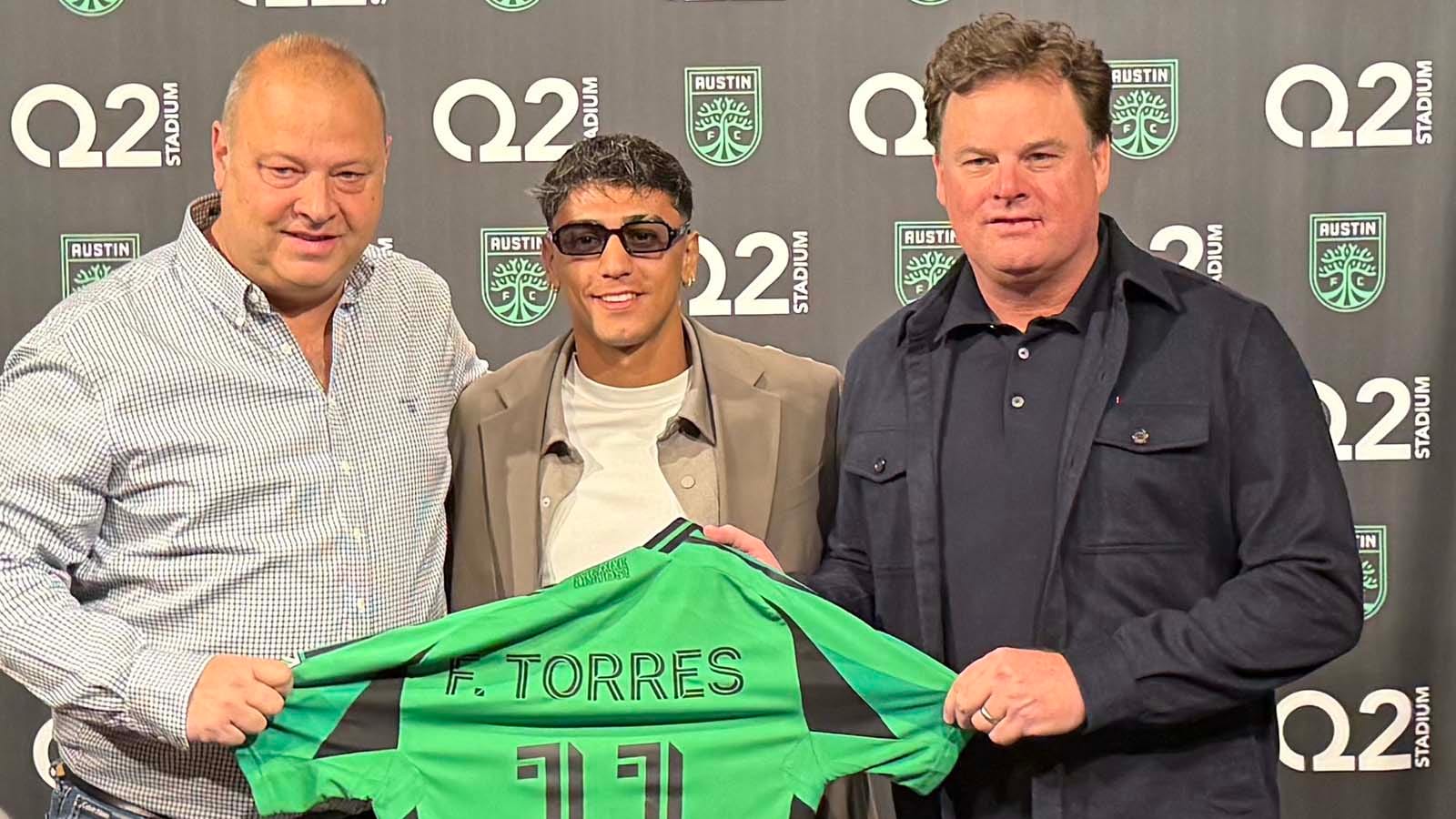 Austin FC sporting director Rodolfo Austin FC sporting director Rodolfo Borrell and CEO Anthony Precourt with new designated player Facundo Torres 